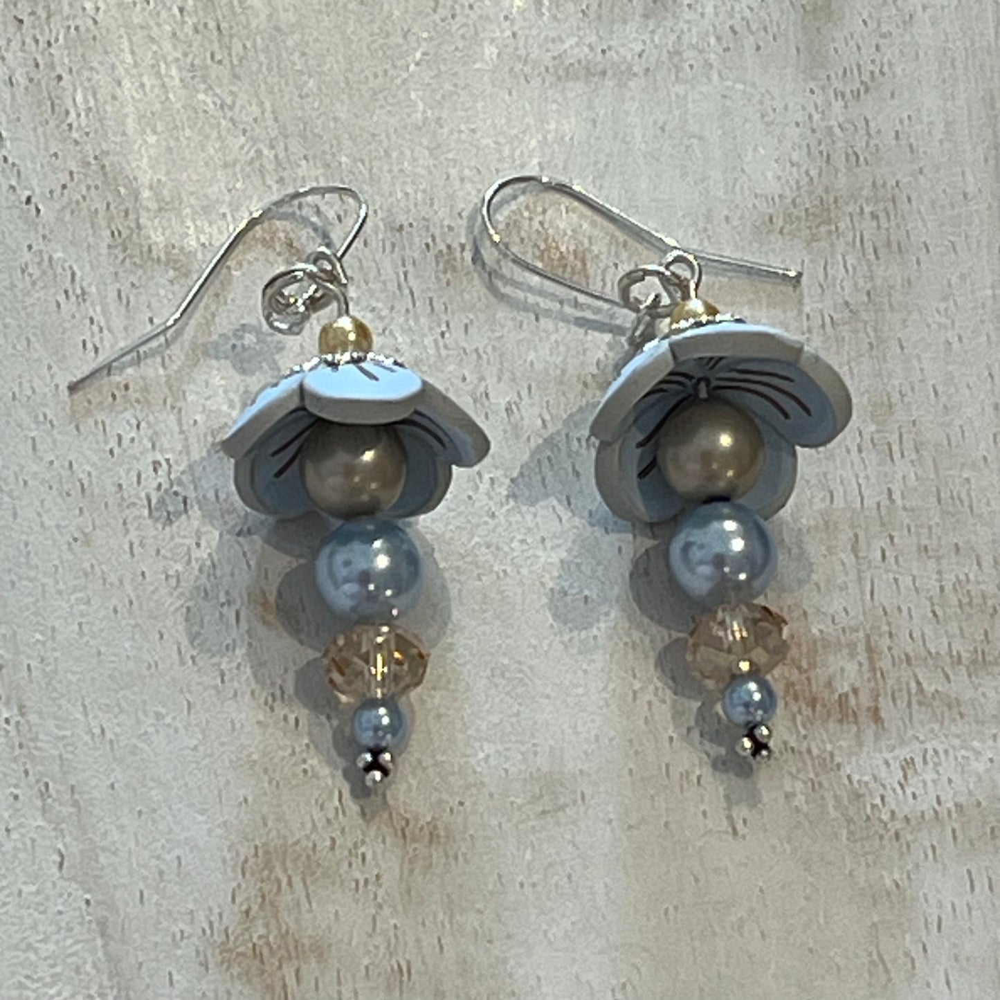 Pastel Blossom sterling silver earrings with Swarovski pearls and light blue floral details by Stephanie Fraselle