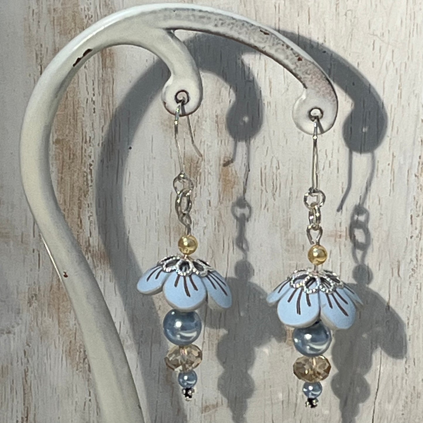 Pastel Blossom sterling silver earrings with Swarovski pearls and light blue floral details by Stephanie Fraselle
