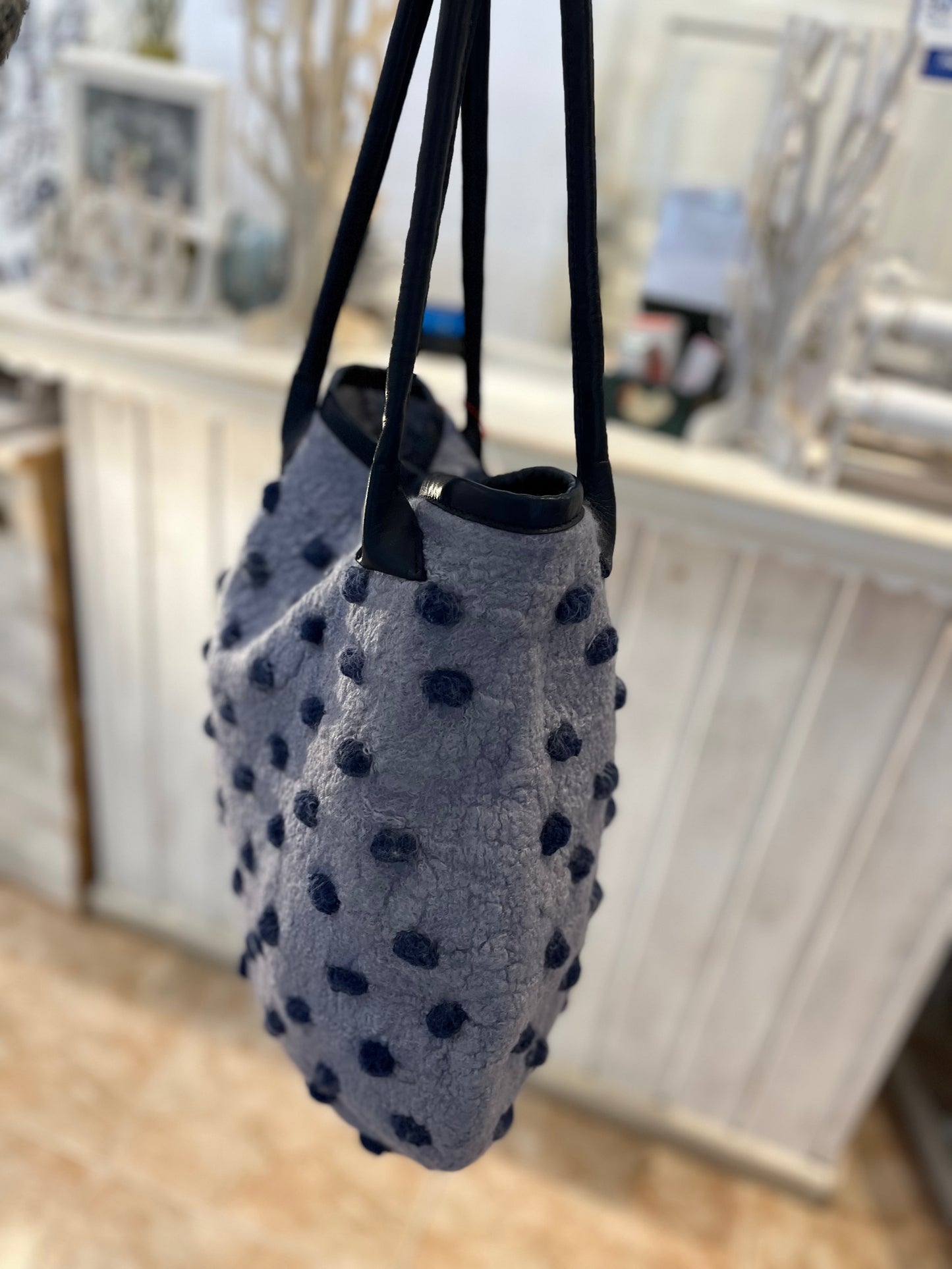 Rare handcrafted Nuno-felted Blue Pebbled Bag with deep tuareg blue pebbles on shabby grey-blue wool base