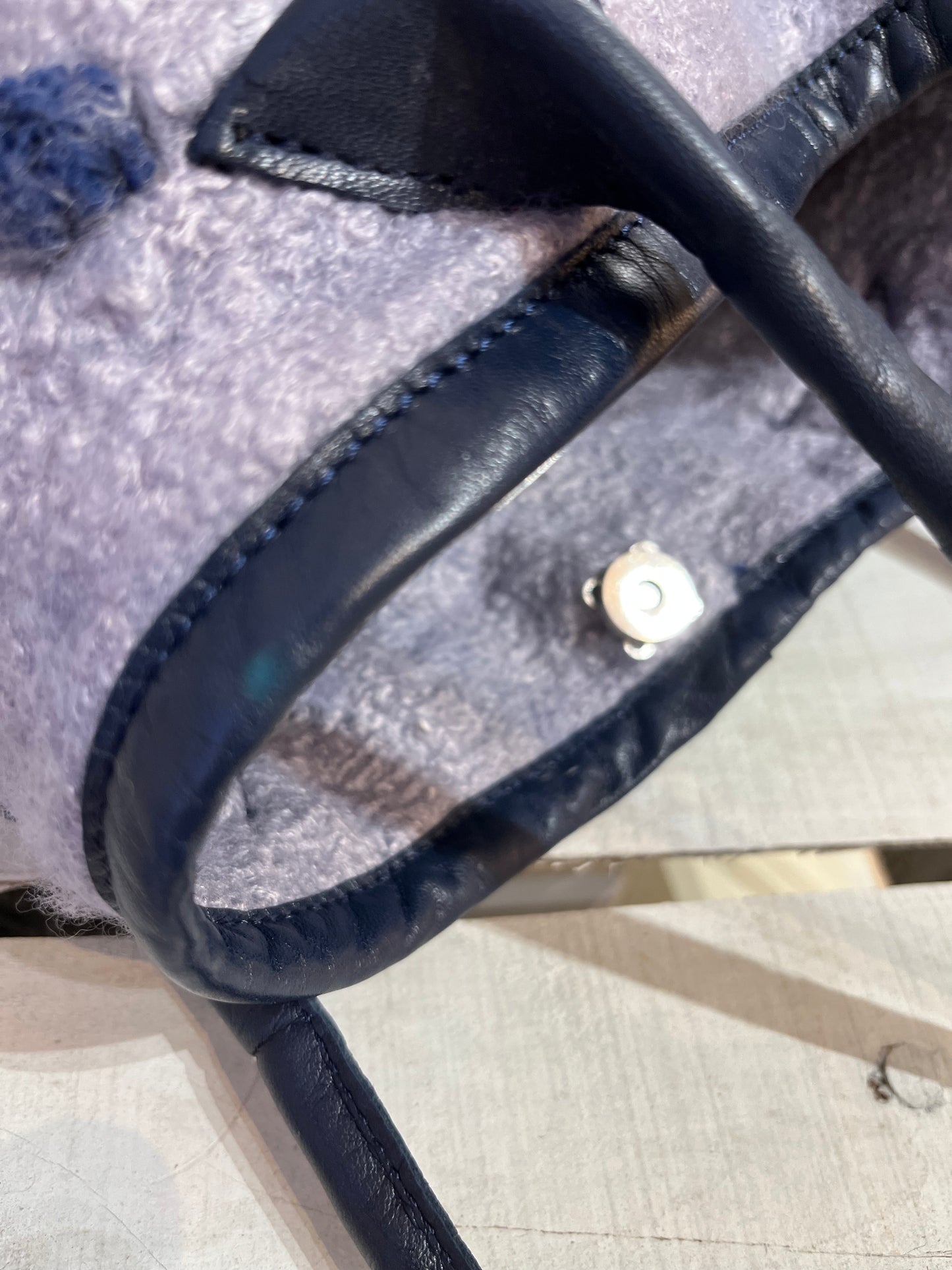 Rare handcrafted Nuno-felted Blue Pebbled Bag with deep tuareg blue pebbles on shabby grey-blue wool base