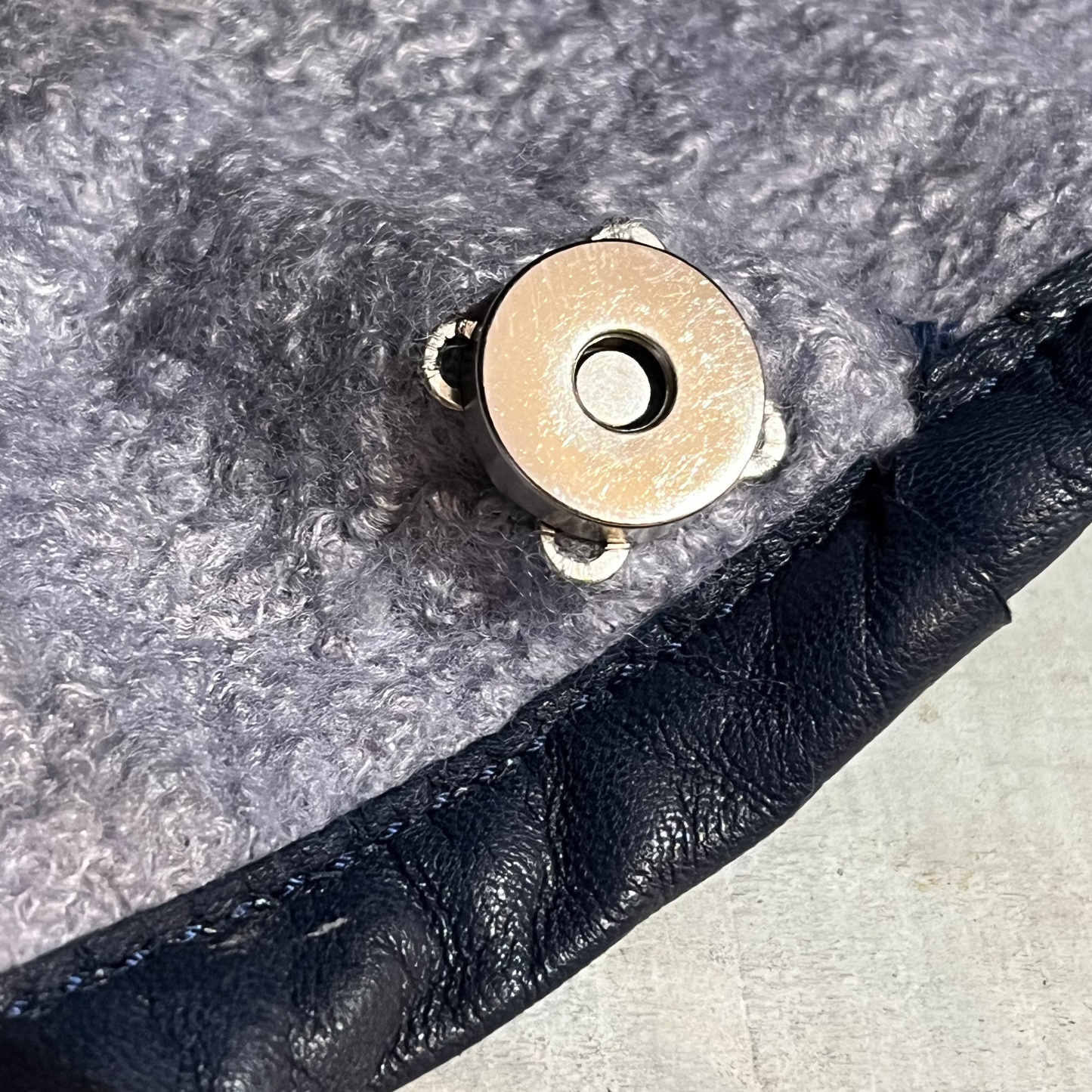Rare handcrafted Nuno-felted Blue Pebbled Bag with deep tuareg blue pebbles on shabby grey-blue wool base