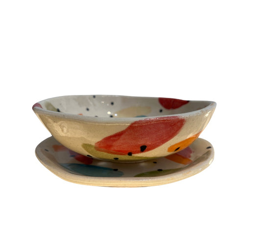 Handcrafted ceramic fruit colander with drip plate in colorful glaze from the Tutti series