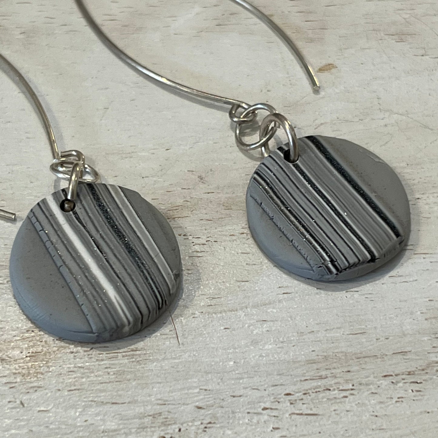Twilight Shadow sculptural earrings in silver and grey tones handmade by Stephanie Fraselle
