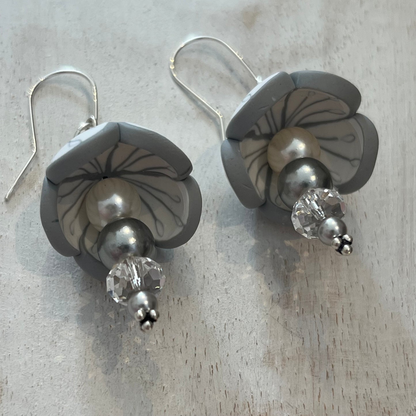 Handcrafted White Blossom Flower Stem Earrings in Sterling Silver 925 with Swarovski pearl and crystal, designed by Stephanie Fraselle