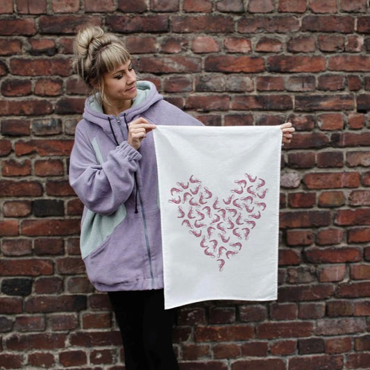 Linen tea towel with pink shrimps forming a heart design by Ligarti