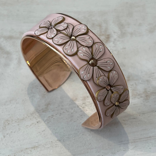 Rose Gold Bloom Cuff by Stephanie Fraselle, featuring hand-sculpted polymer clay flowers with Swarovski crystals and rose gold-plated brass base
