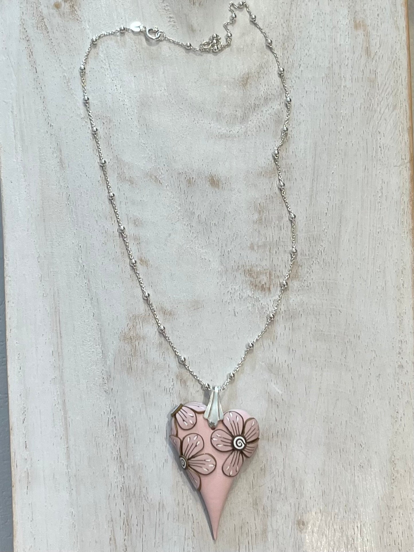 Curved Heart Pendant in Powder Rose by Stephanie Fraselle – Handmade Sculptural Necklace with Floral Accent