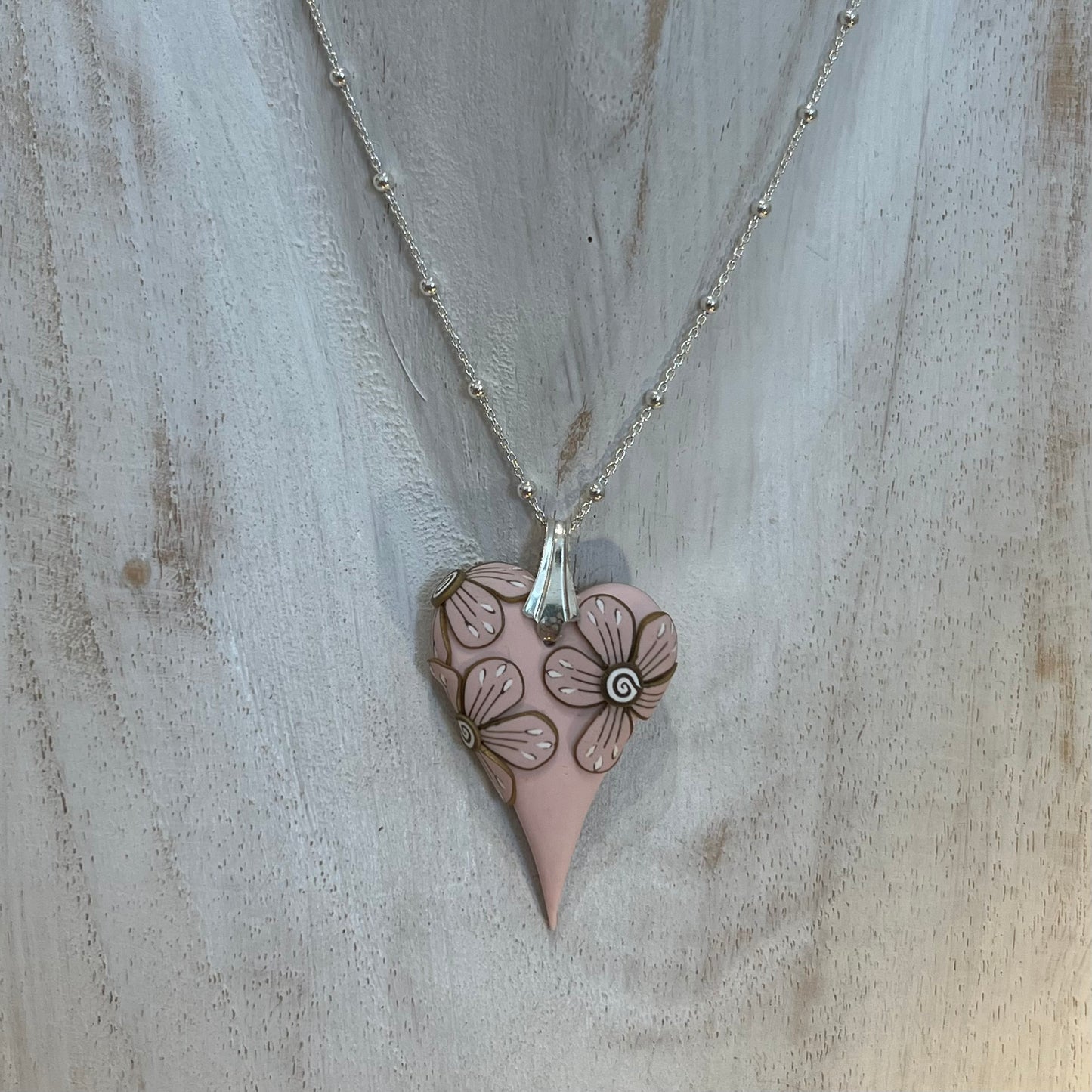 Curved Heart Pendant in Powder Rose by Stephanie Fraselle – Handmade Sculptural Necklace with Floral Accent