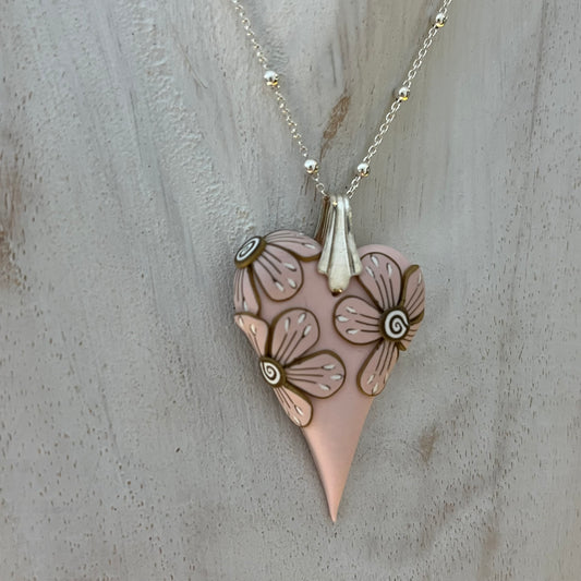 Curved Heart Pendant in Powder Rose by Stephanie Fraselle – Handmade Sculptural Necklace with Floral Accent