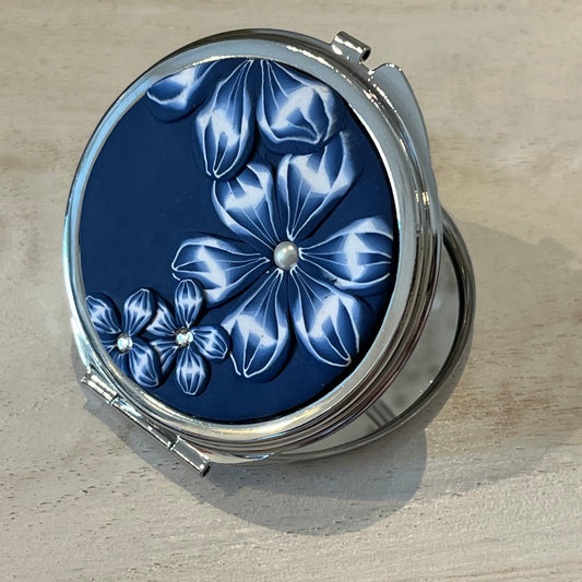 Navy Blue Floral Bloom Pocket Mirror by Stephanie Fraselle, handcrafted in polymer clay with Swarovski crystal accents