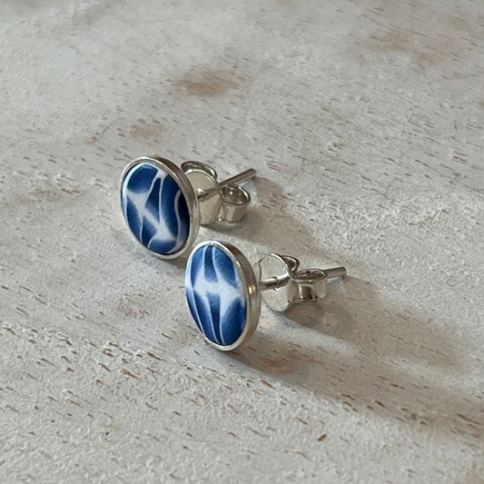 Handcrafted sterling silver stud earrings with sapphire cabochon by Stephanie Fraselle