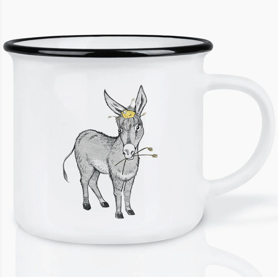 Minimalist ceramic mug featuring an illustration of a grazing donkey, designed by artist Hanna