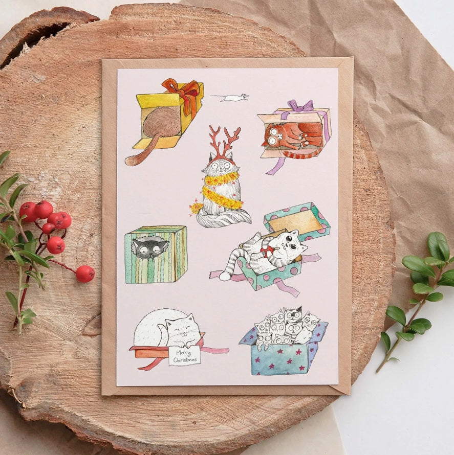 Bamboo Christmas greeting card featuring Hanna’s colourful illustrated cats with “Merry Christmas” tucked into a cat’s paw