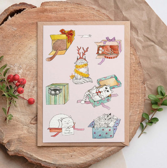 Bamboo Christmas greeting card featuring Hanna’s colourful illustrated cats with “Merry Christmas” tucked into a cat’s paw