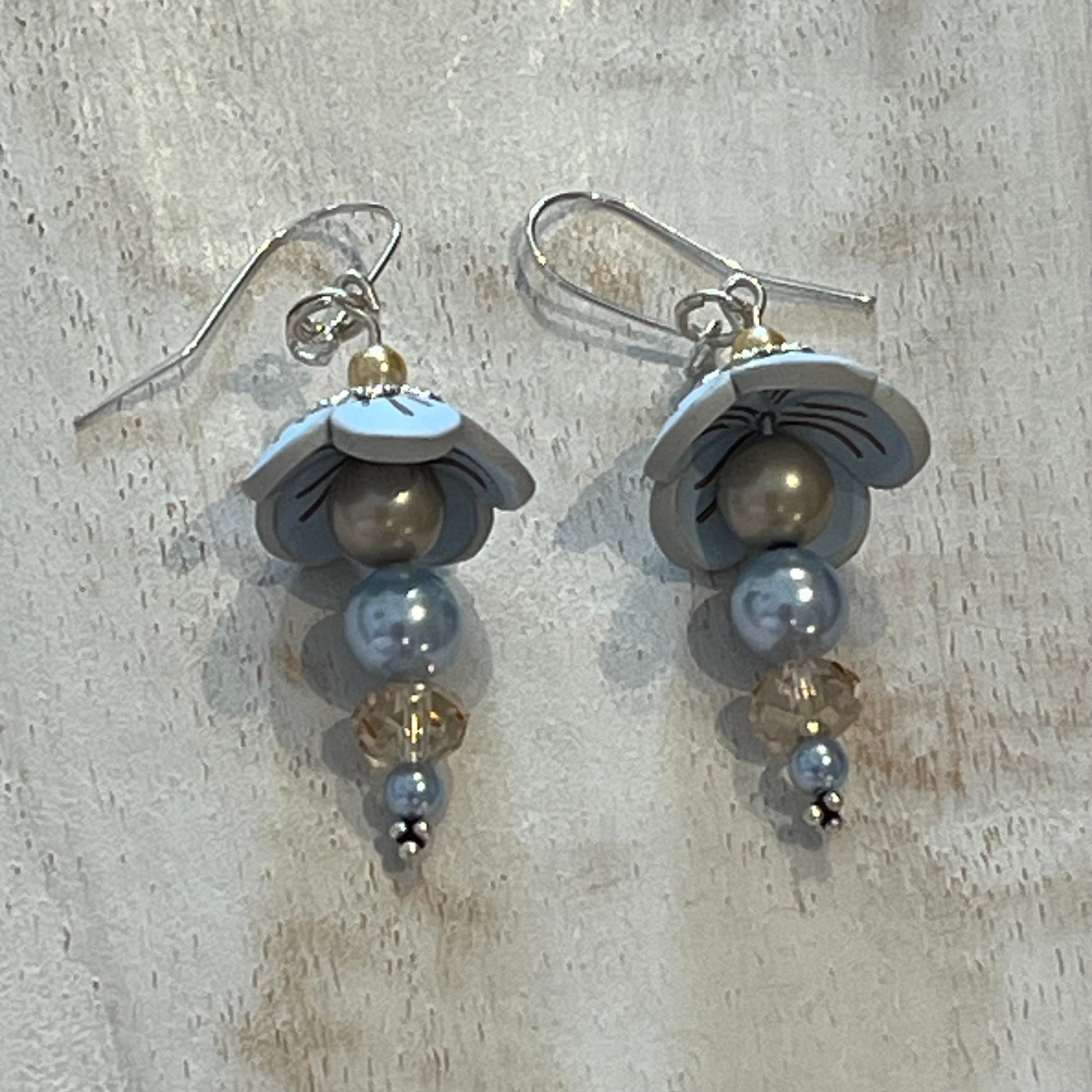 Pastel Blossom sterling silver earrings with Swarovski pearls and light blue floral details by Stephanie Fraselle