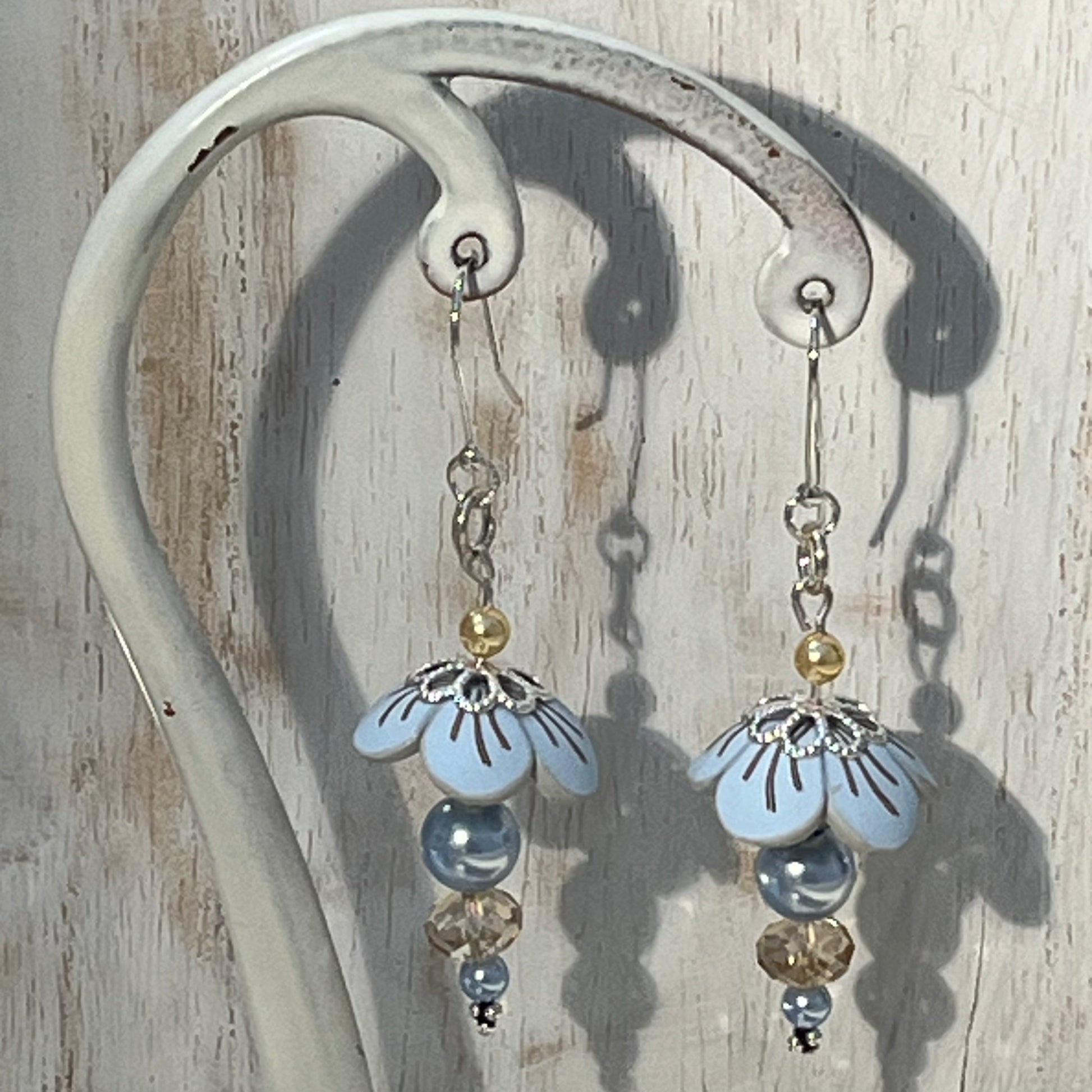 Pastel Blossom sterling silver earrings with Swarovski pearls and light blue floral details by Stephanie Fraselle