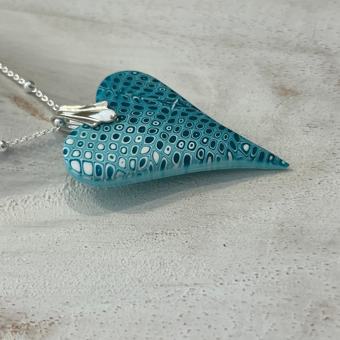 Curved Sculpted Heart Pendant – Tranquil Waters Collection by Stephanie Fraselle