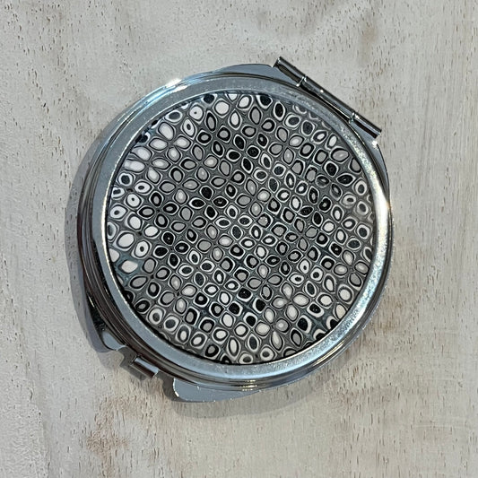 Moonlit Mosaic Shimmer Pocket Mirror by Stephanie Fraselle with hand-laid silver, grey, and pearl clay tiles on rhodium finish