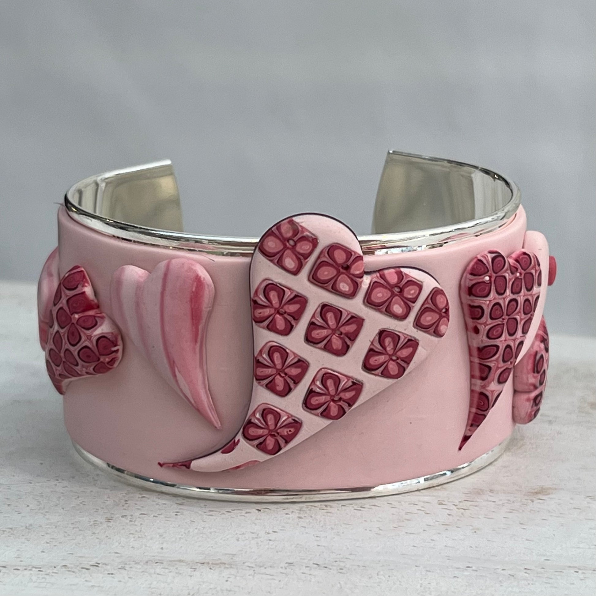 Stephanie Fraselle handcrafted polymer clay love heart bracelet cuff in crimson pink tones