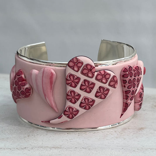 Stephanie Fraselle handcrafted polymer clay love heart bracelet cuff in crimson pink tones
