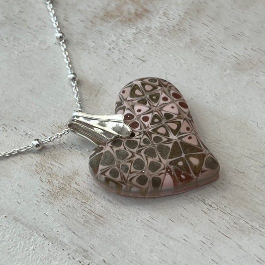 Artisan necklace with a rose-toned mosaic heart pendant, handcrafted in Europe with sterling silver beads by Stephanie Fraselle.