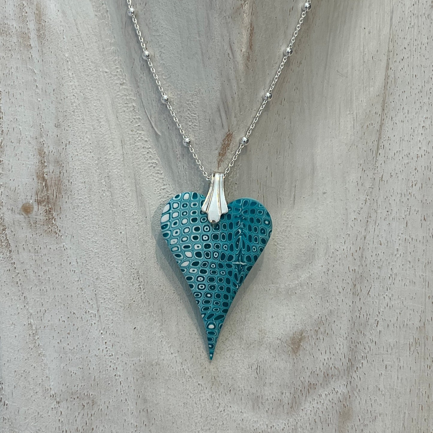 Curved Sculpted Heart Pendant – Tranquil Waters Collection by Stephanie Fraselle