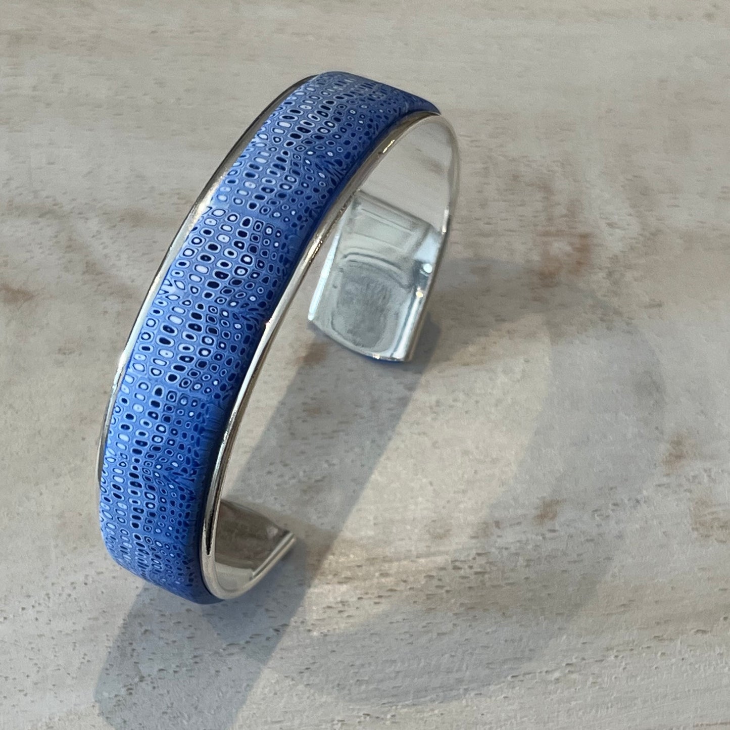 Handmade sapphire blue adjustable bracelet with sterling silver finish, artisan cuff by Stephanie Fraselle made in Lanzarote
