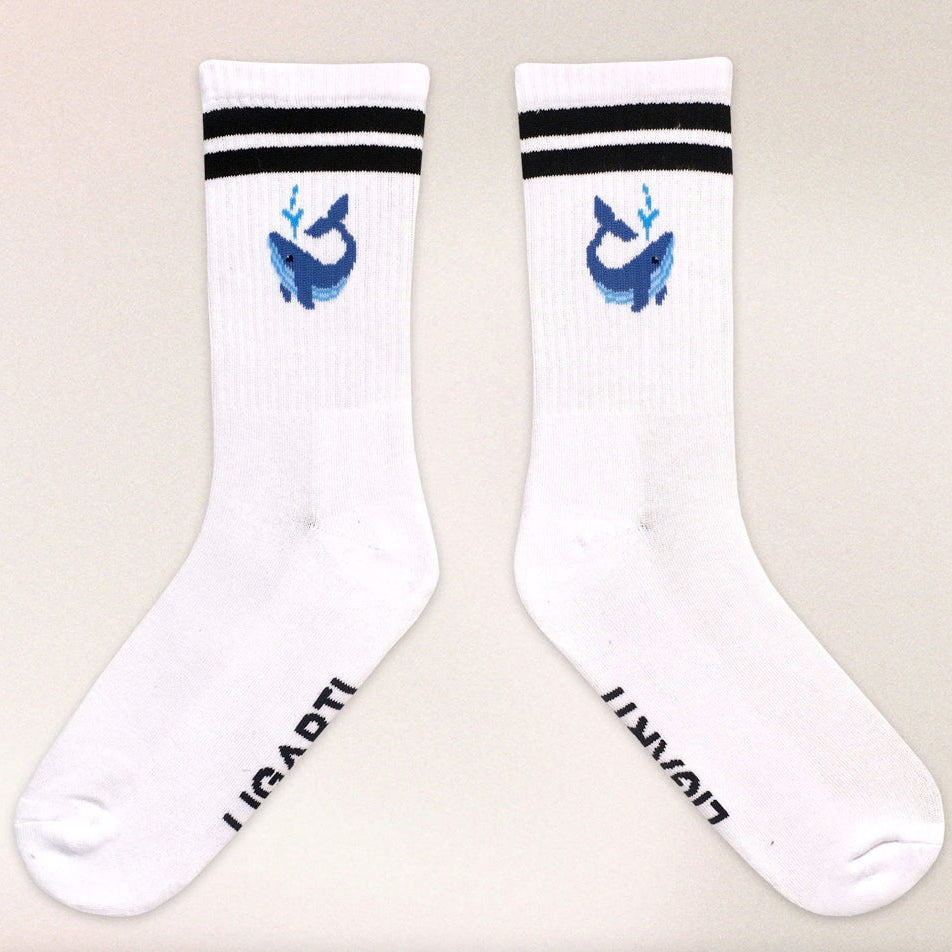 Minimalist cotton socks featuring Walter the Whale motif inspired by artist Hanna’s original artwork