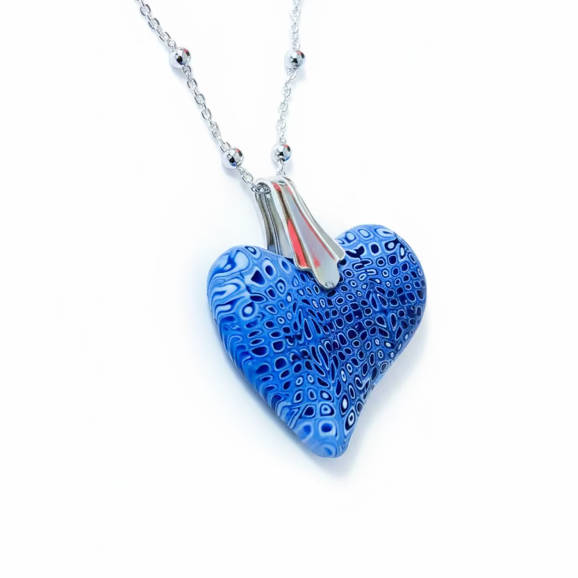 Blue textured heart-shaped pendant on a chain