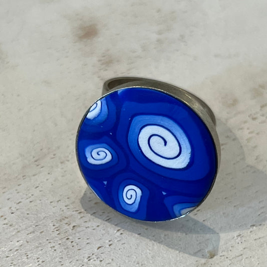 Handcrafted Marégraphie Swirl Adjustable Ring in ocean blues and white, polymer clay with sterling silver coating, designed by Stephanie Fraselle