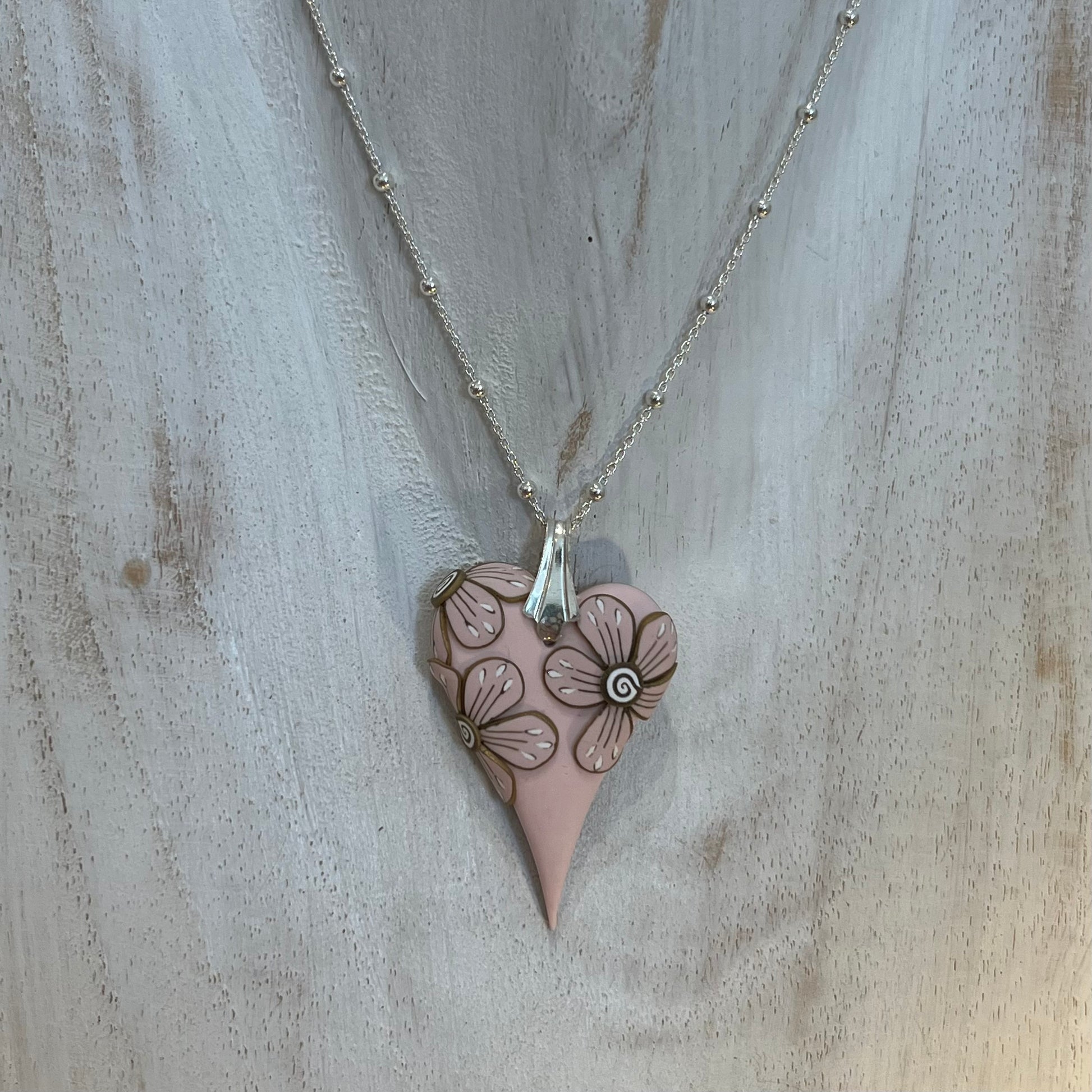 Curved Heart Pendant in Powder Rose by Stephanie Fraselle – Handmade Sculptural Necklace with Floral Accent