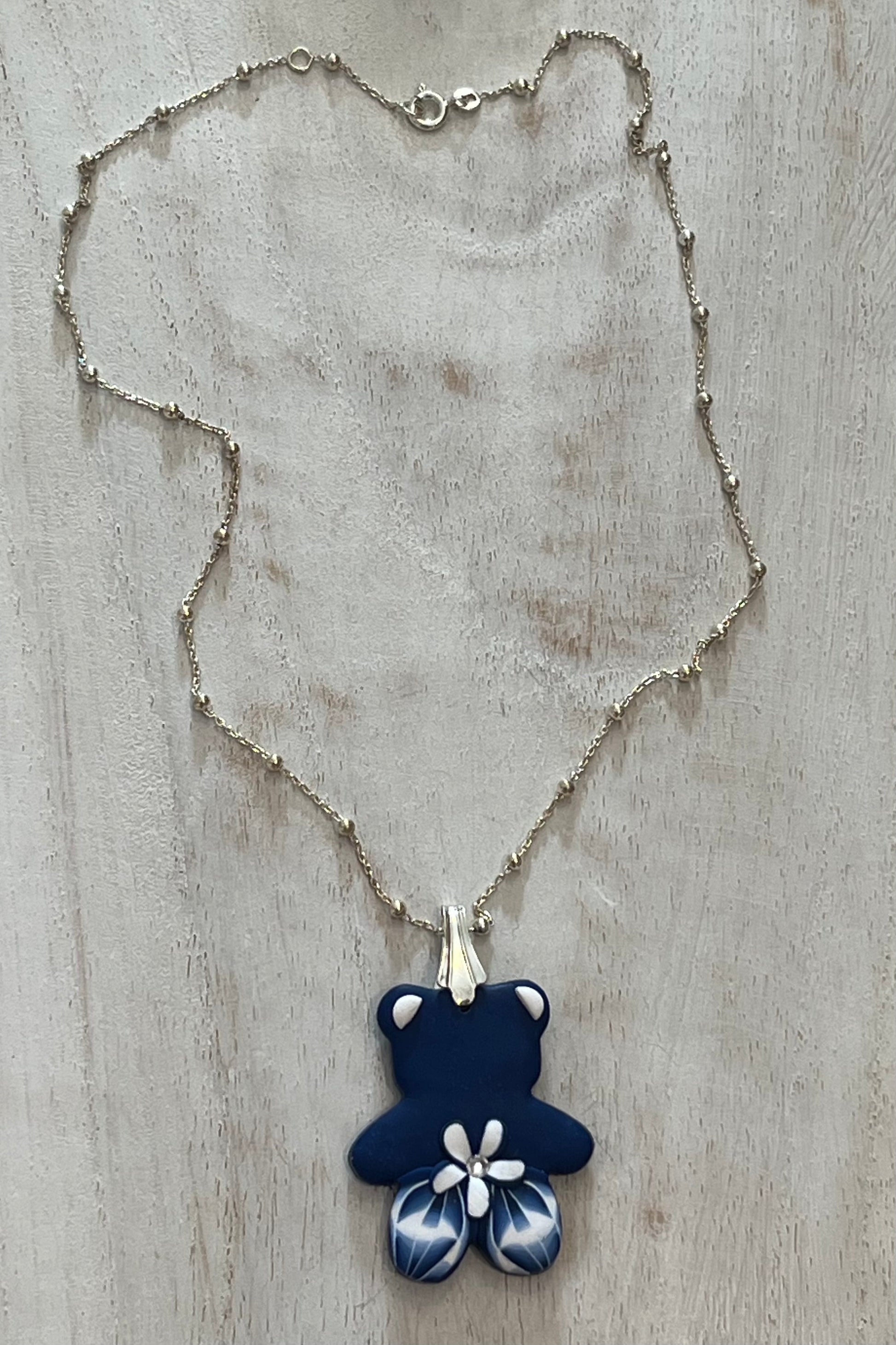 Minimalist handcrafted navy bear pendant with marégraphie polymer clay design on sterling silver chain