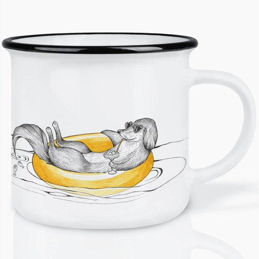 Minimalist ceramic mug featuring an illustrated dog on a yellow float with cocktail, designed by Hanna